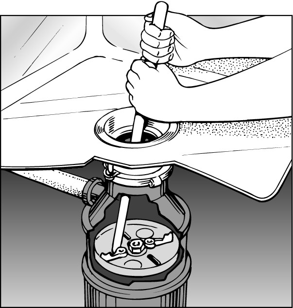 Figure 4-4: Inserting a wooden stick in the disposer.